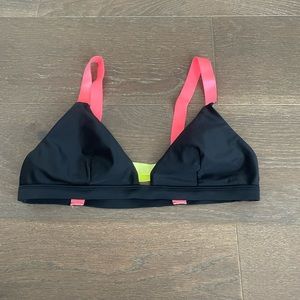 Super trendy black and neon bikini top!